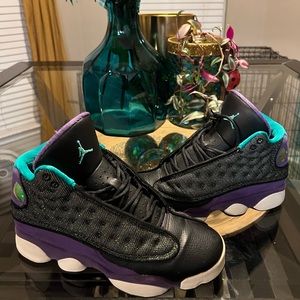 Boys size 5.5y black blue and purple in color Jordan’s